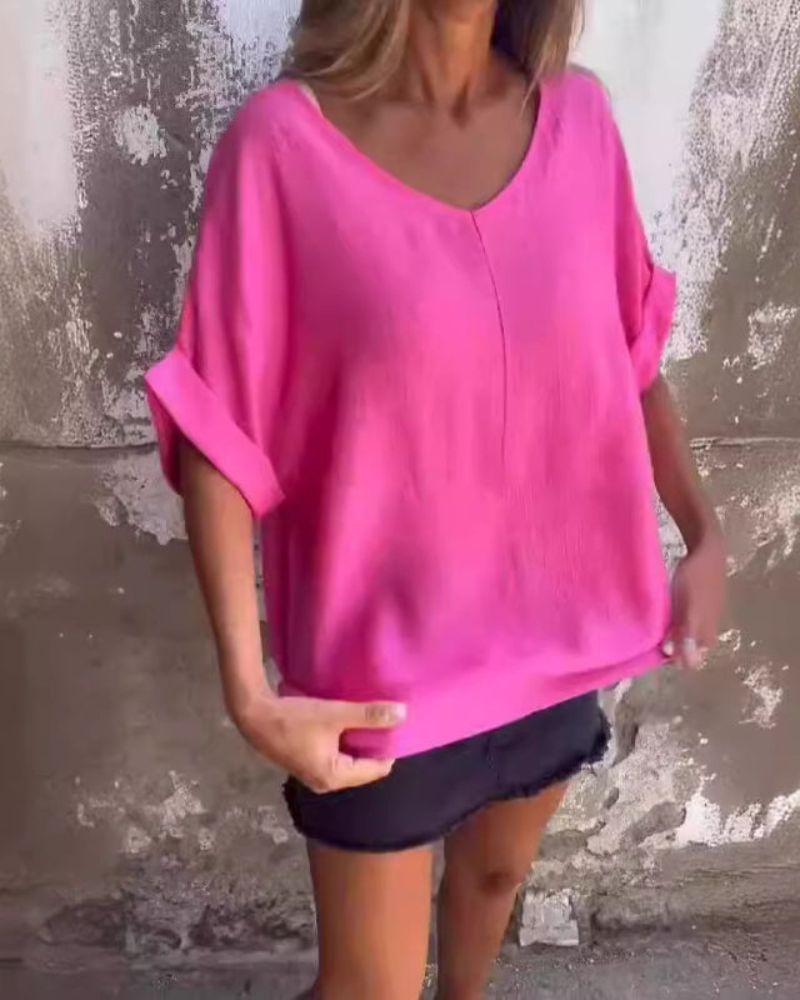 Comfortable and versatile women's V-neck casual top with half sleeves, offering effortless style for everyday wear.