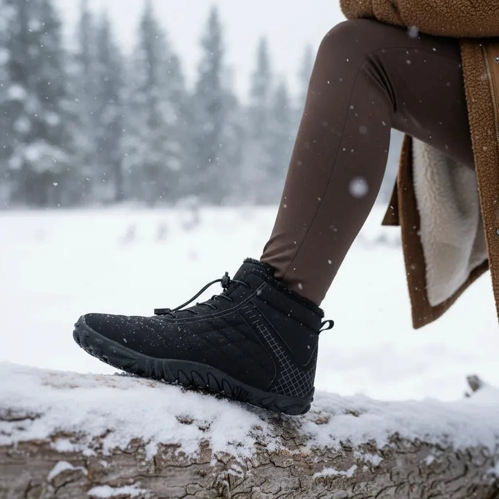 Warm, comfortable unisex snow boots for cold winter weather, featuring durable design.