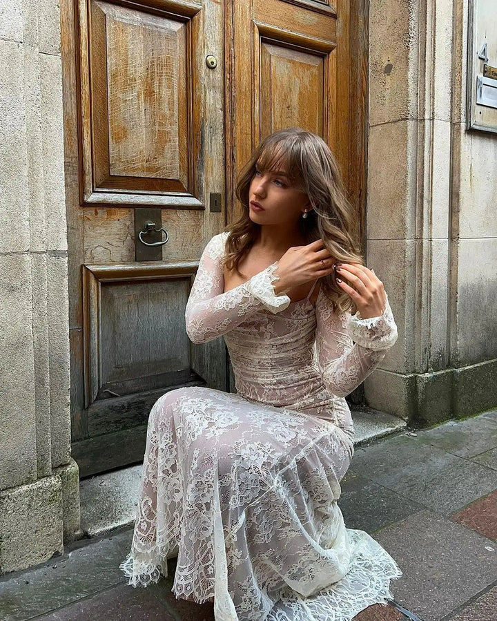 Full-length view of an elegant women's lace maxi dress, perfect as a formal evening gown for special occasions.