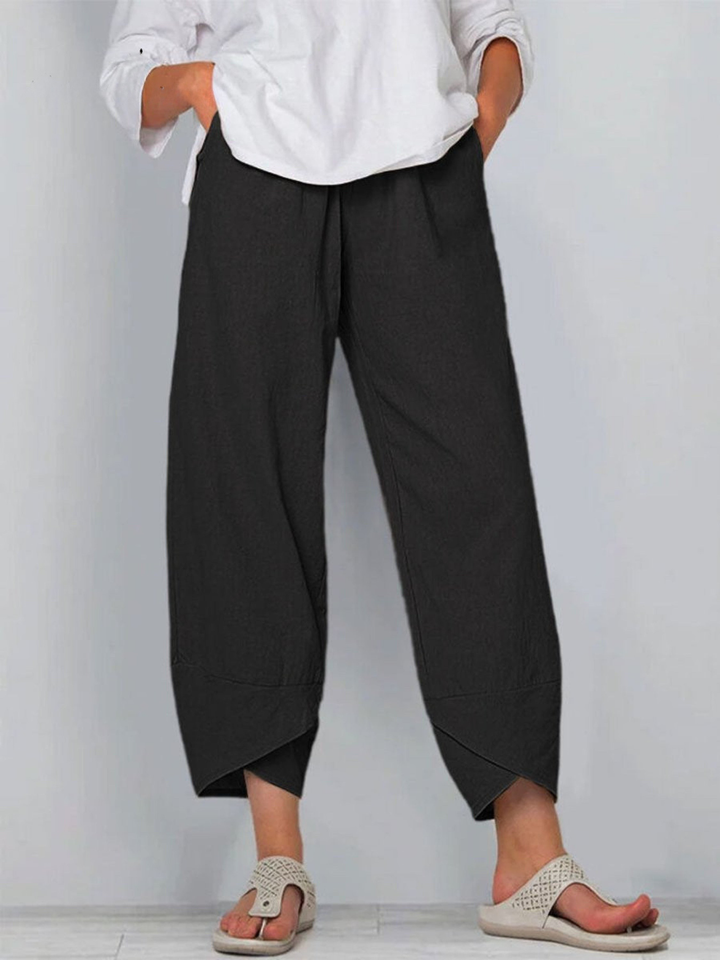 Women's loose fit linen harem trousers with wide leg & elastic waist, perfect for casual summer wear.
