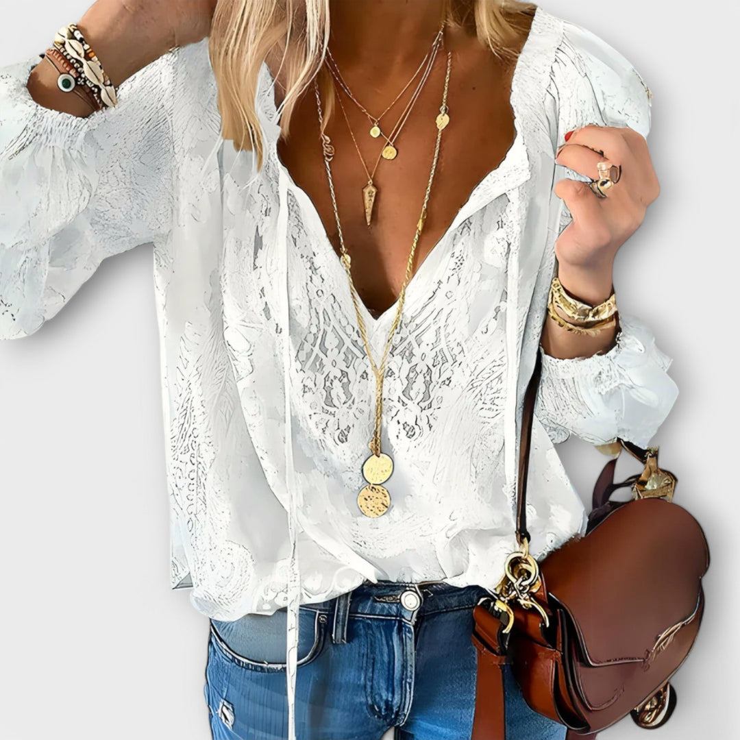 Elegant women's V-neck lace overlay blouse with stylish tie front detail, perfect for versatile fashion.
