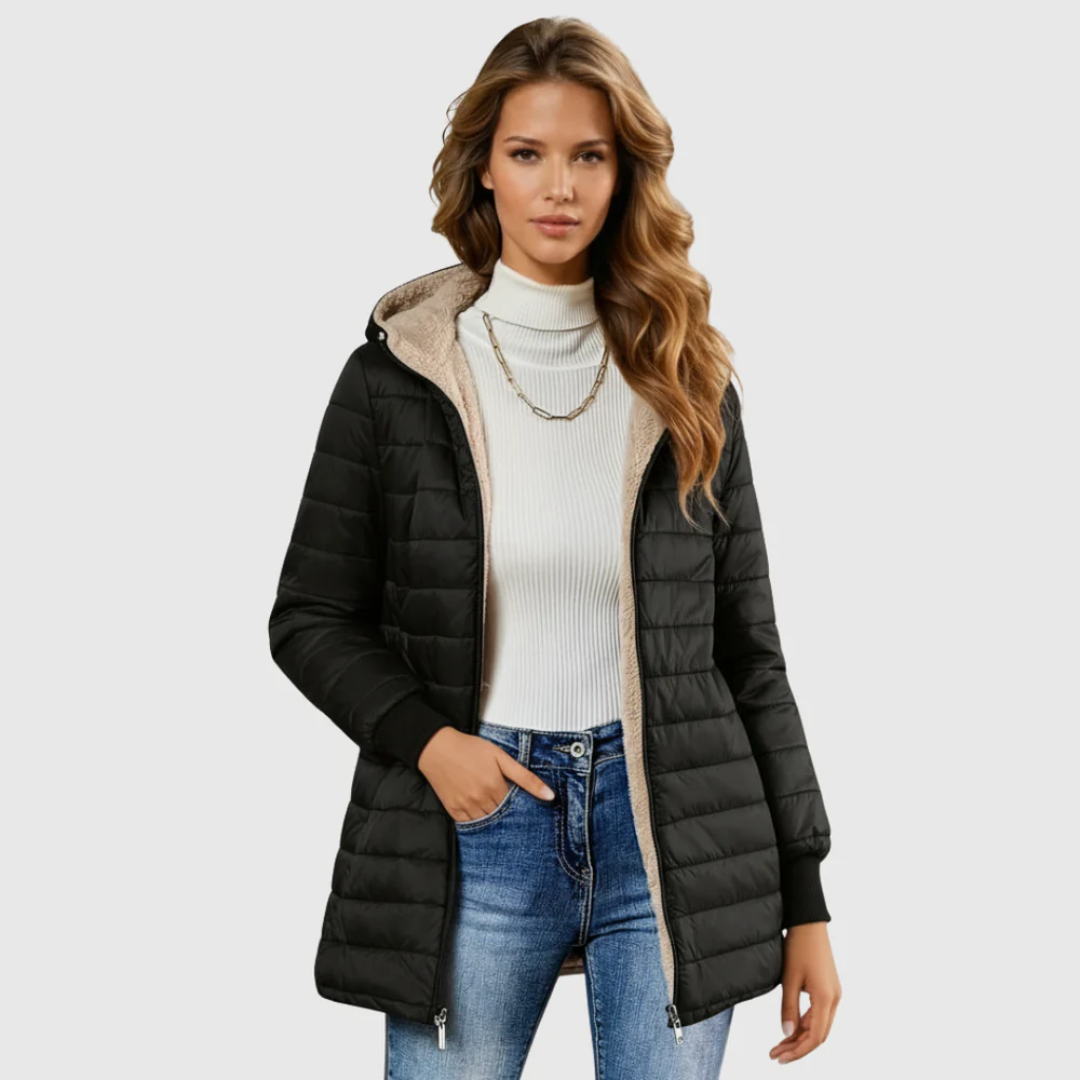 Ladies longline hooded puffer jacket, quilted for warmth & everyday casual wear in transitional weather.