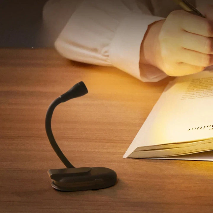 Lightweight travel book light, a dimmable LED clip-on lamp providing perfect eye comfort for reading on the go.