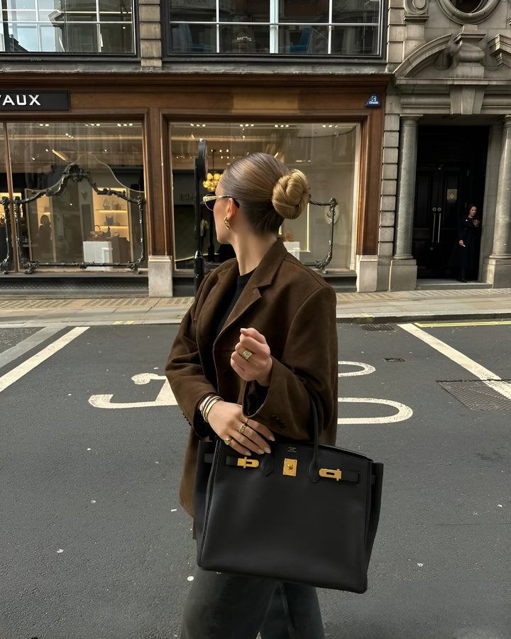 Classic long-sleeve women's one-button blazer. Elegant outerwear for a polished, comfortable look.