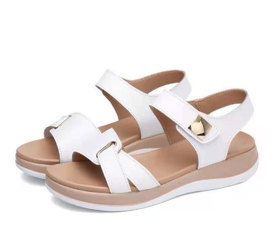 Stylish open-toe ladies sandals with adjustable straps, offering wide-fit comfort for everyday casual summer wear.