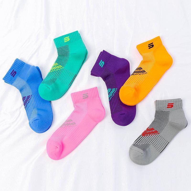 Pro ankle compression socks providing foot support, pain relief, and circulation boost for active use.