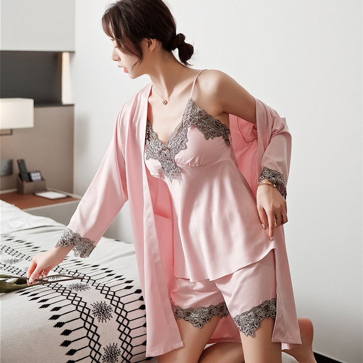 Luxurious women's 5-piece satin sleep set with delicate lace trim, perfect for comfortable nightwear & loungewear.