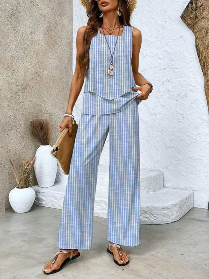Fashionable women's summer set with a comfortable sleeveless top and trendy wide leg pants. Casual elegance.