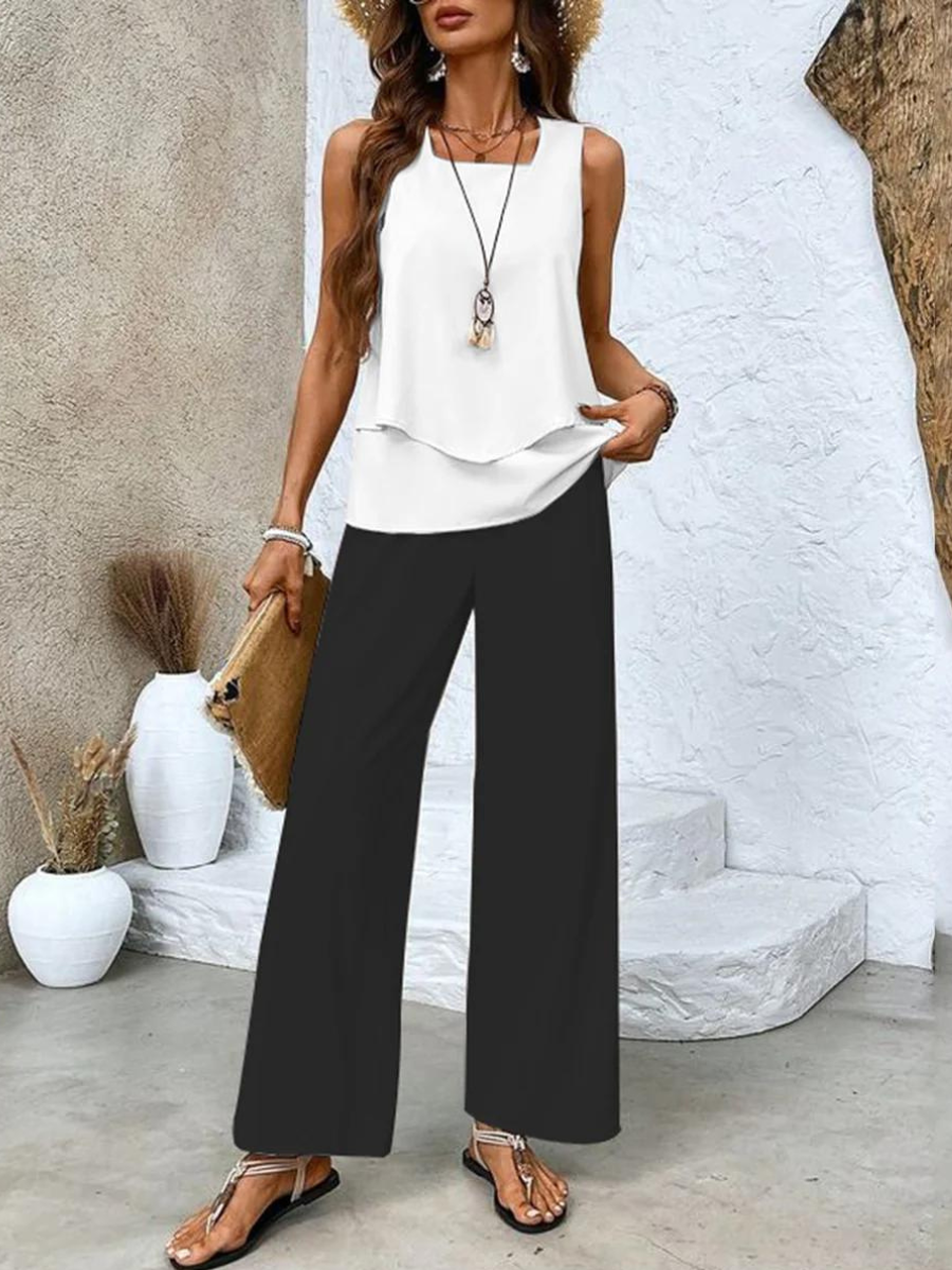 Women's comfortable two-piece summer outfit: a sleeveless tank top and stylish wide-leg trousers.