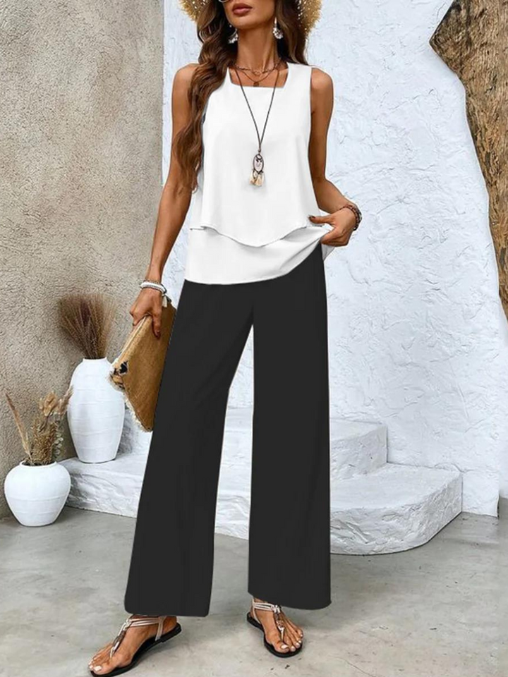Women's comfortable two-piece summer outfit: a sleeveless tank top and stylish wide-leg trousers.