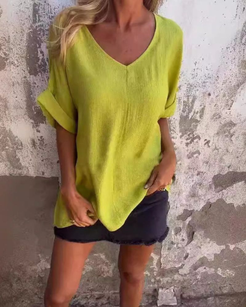 Women's effortless flow V-neck casual top with half sleeves, ideal for comfortable, loose fit summer everyday wear.