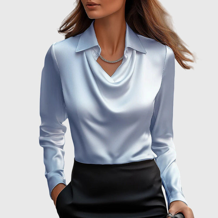 Elegant women's blouse top with sophisticated pleated neckline, suitable for professional office & chic casual looks.