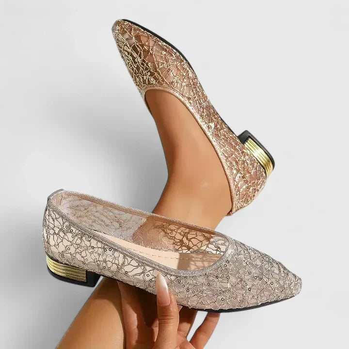 Comfortable women's pointed flats with an elegant gold heel, designed for wedding guests & sophisticated evening wear.