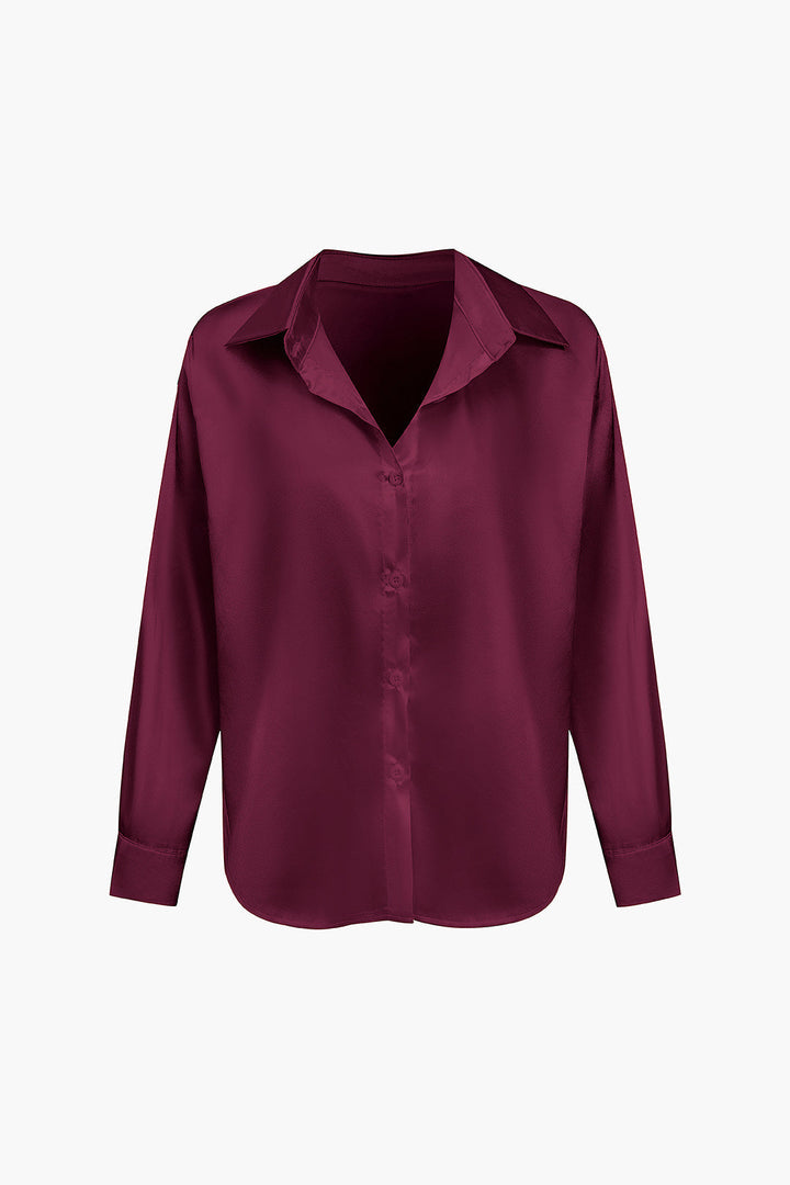 Chic women's long-sleeve button-down blouse, an elegant choice for any look.