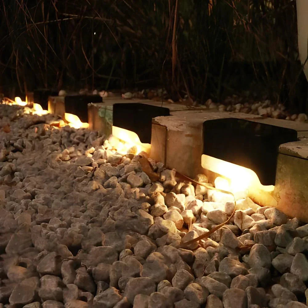 Easy-install Nvroome solar step lights for garden stairs, showcasing their sleek, compact design.