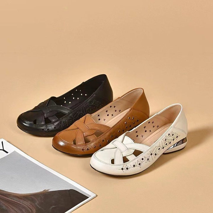 White women's slip-on block heel loafers, offering comfortable and stylish footwear for any occasion.
