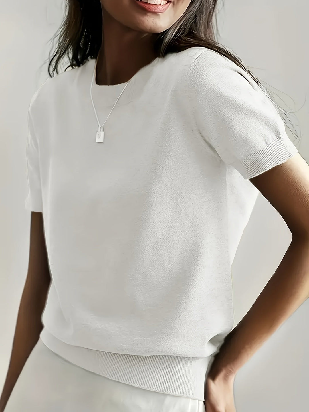 Effortless women's summer top, a comfortable short-sleeve t-shirt with a relaxed fit for casual style.