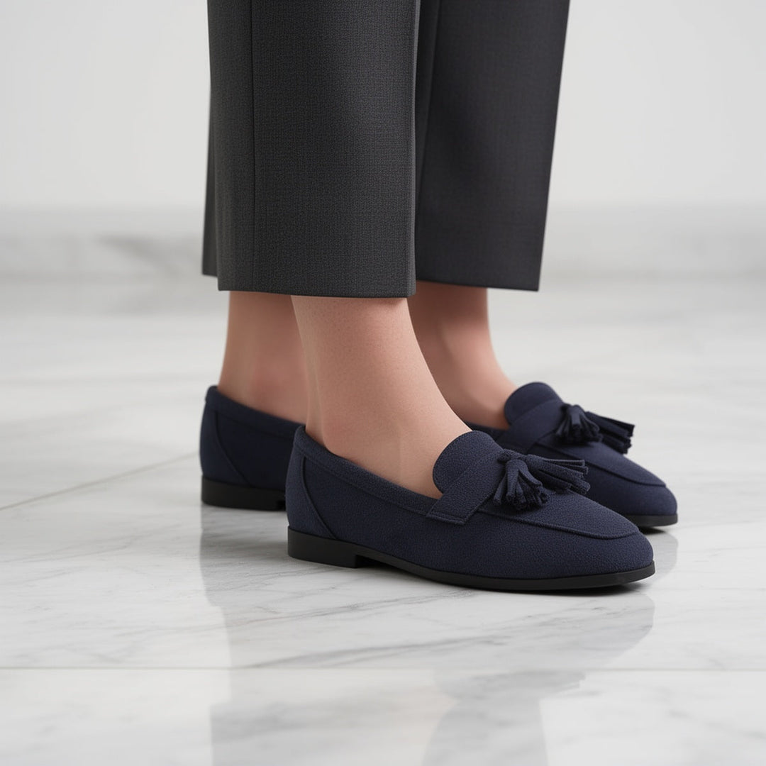 Women's elegant navy blue tassel loafers, comfortable slip-on shoes for office & everyday wear.