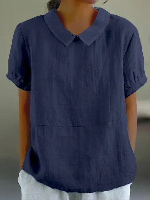 Professional women's classic long-sleeve dress shirt. Button-front, essential elegant office wear for a polished look.