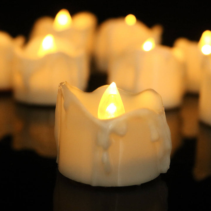 Decorative flickering LED flameless candle set, creating warm mood lighting & safe ambiance for any room.