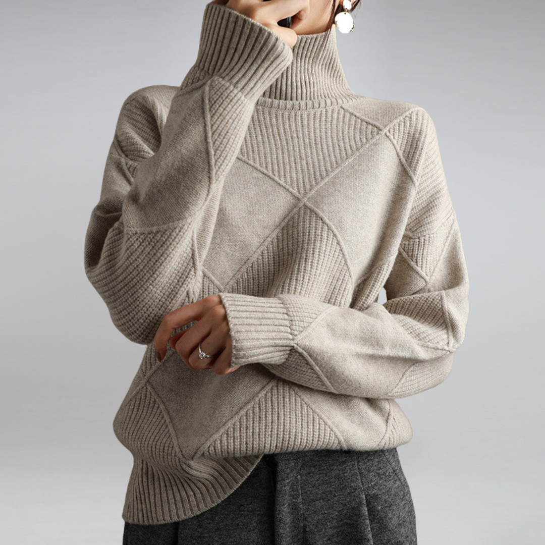 Soft knitted women's turtleneck sweater. Cozy long-sleeve design for elegant winter fashion.