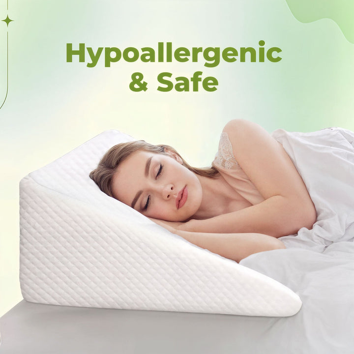 Comfortable white wedge pillow offering back support and improved leg circulation.
