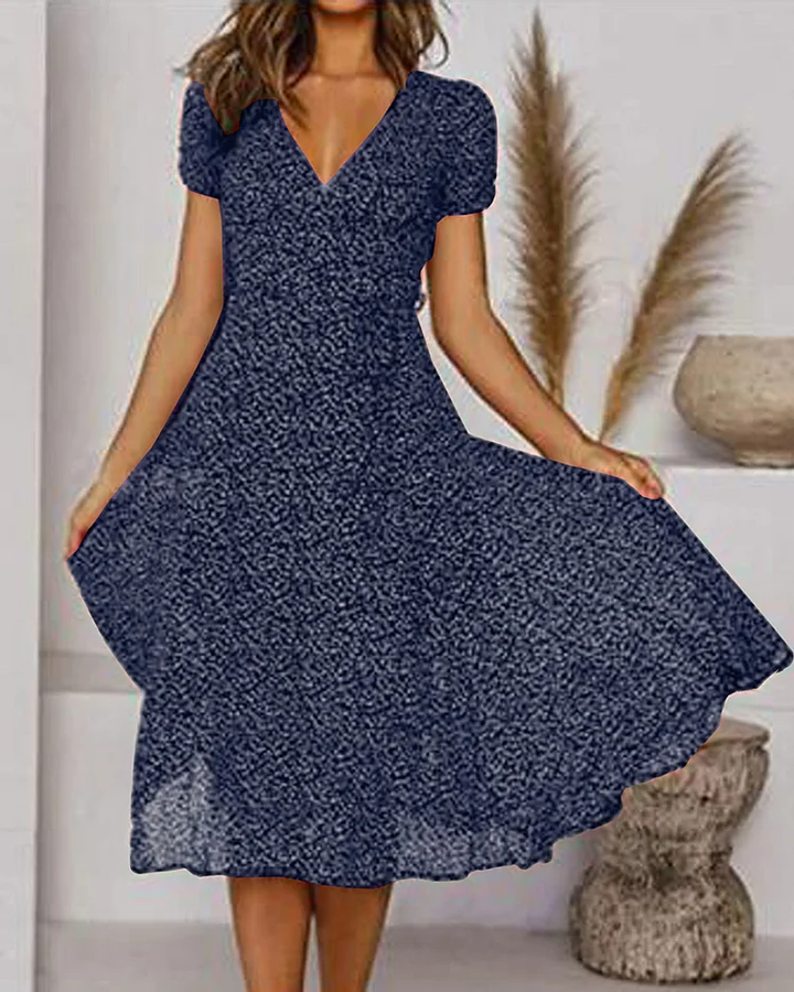 Chic black V-neck midi dress for women featuring stylish puff sleeves and a flattering fit & flare silhouette.