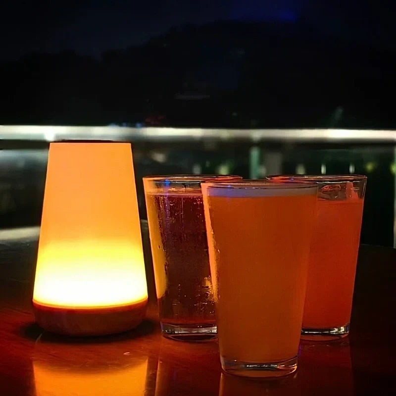Modern multicolor LED night light, sleek design with touch & remote dimming. Enhances home decor.