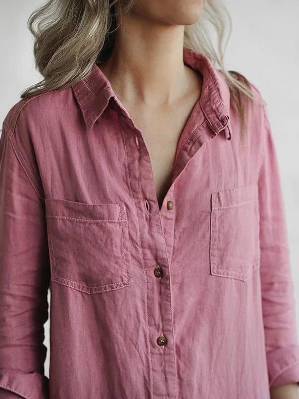 Fashionable women's long sleeve button-front jumpsuit. A chic, comfortable one-piece for versatile styling.
