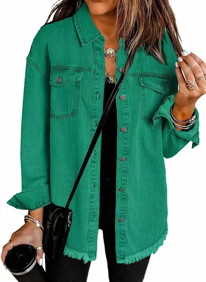 Women's longline denim jacket, button-down style. Chic casual outerwear for fall and spring fashion.