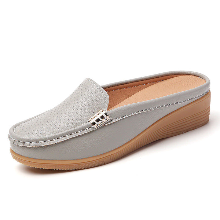 Womens perforated slip-on wedge loafers, stylish and comfy for everyday spring casuals.