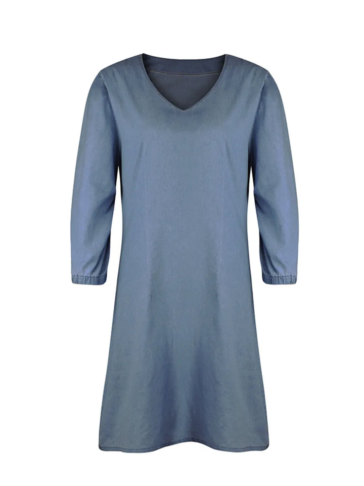 Relaxed fit V-neck dress for women, with comfortable half sleeves, ideal for casual days.