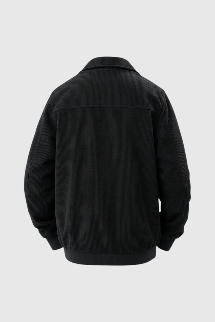 Versatile men's black corduroy jacket, a classic casual button-up, ideal for fall & spring everyday wear.