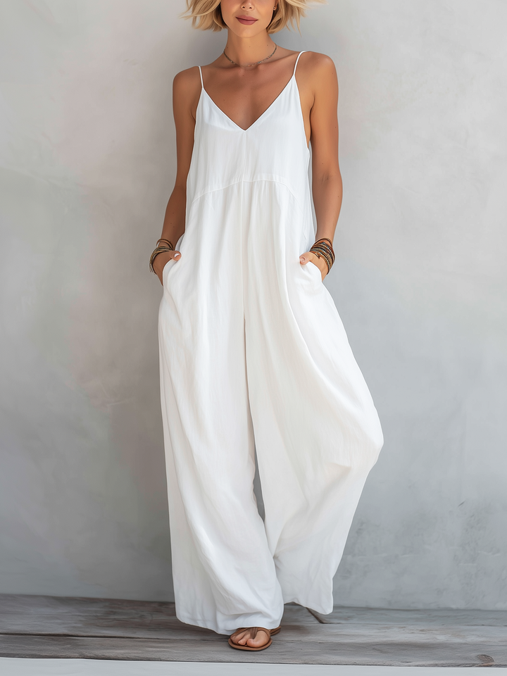 Women's spaghetti strap wide-leg jumpsuit for casual summer wear. Sleeveless, comfortable one-piece.
