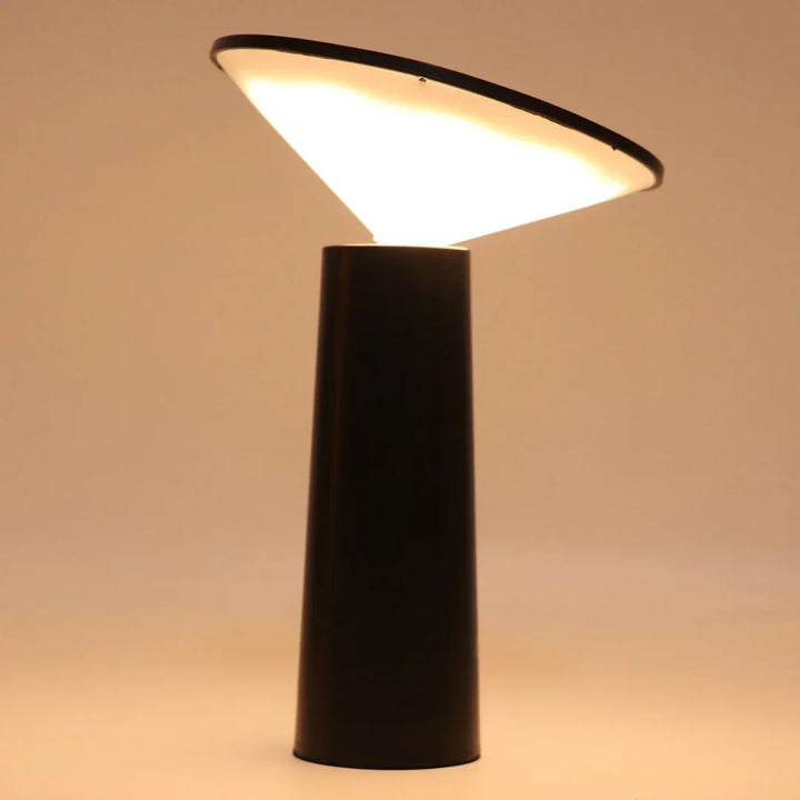 Adjustable modern LED desk lamp, dimmable for optimal lighting in home or office.
