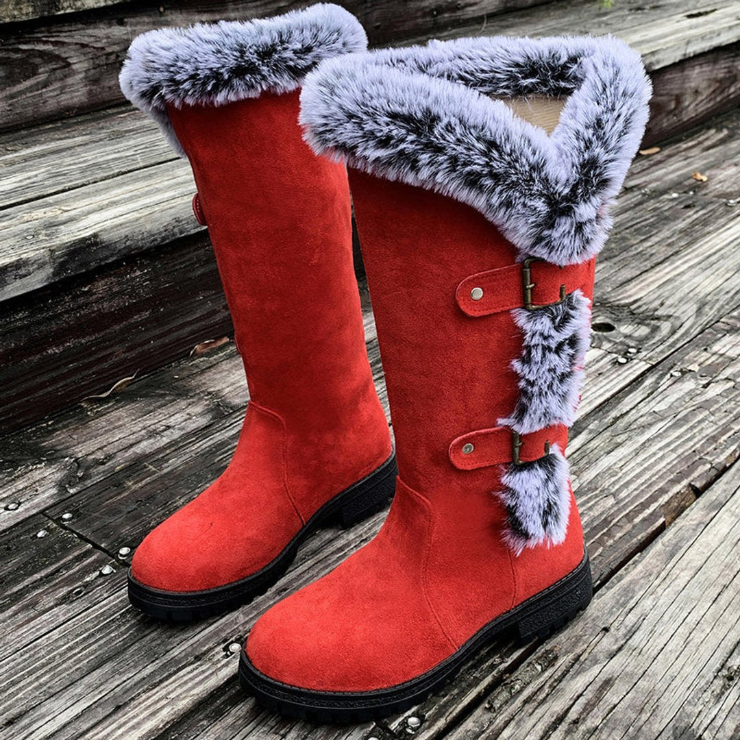 Chic brown women's buckle knee-high boots. Perfect cozy winter footwear, offering tall, fashionable style.
