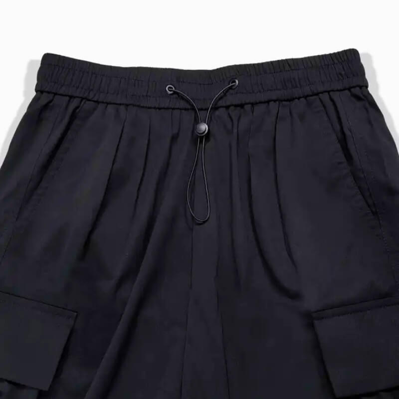 Side view of men's relaxed fit cargo joggers, highlighting spacious cargo pockets.