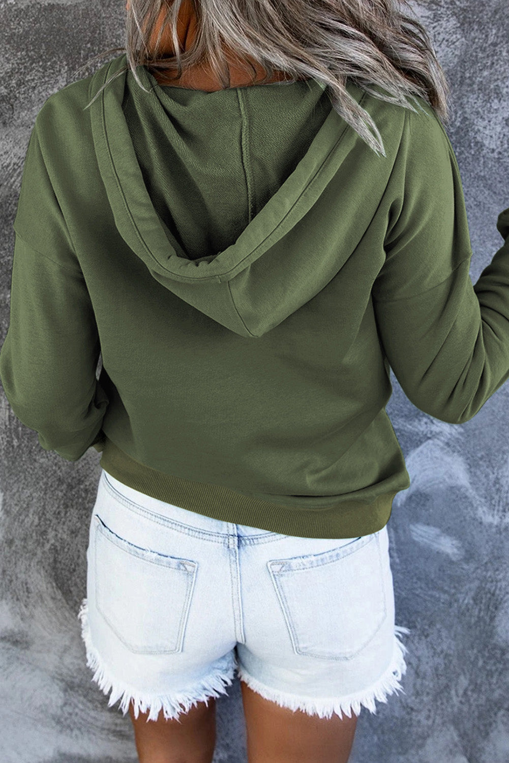 Soft knit women's cozy sweater with hood, perfect for casual and comfortable wear.