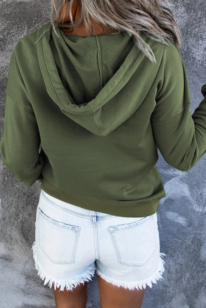 Soft knit women's cozy sweater with hood, perfect for casual and comfortable wear.