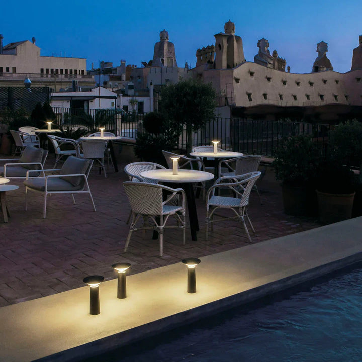 Simple modern LED table lamp, dimmable & portable, ideal for minimalist home decor.