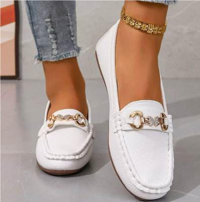 Elegant white women's slip-on loafers, perfect for everyday wear, offering a classic and versatile look.