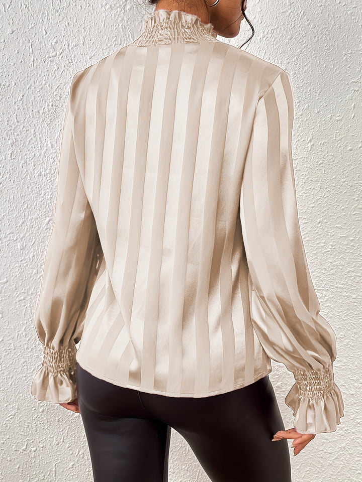 Chic women's high neck long sleeve striped blouse, an elegant and professional top suitable for work.