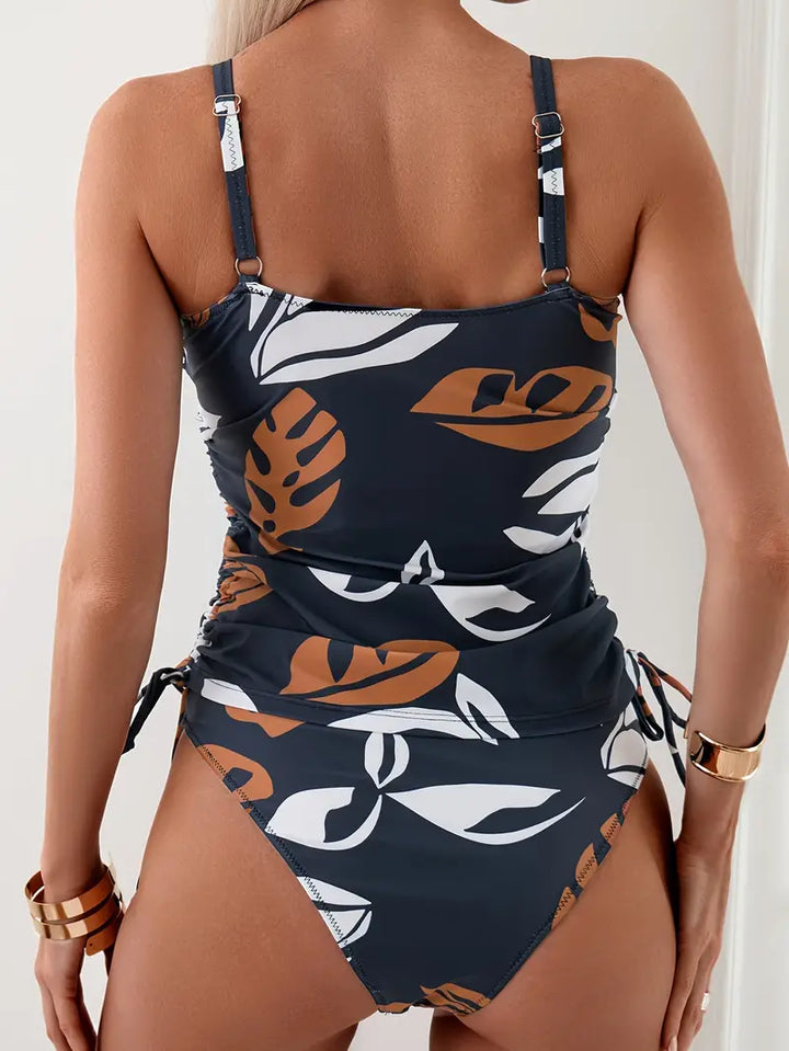 Stylish women's two-piece tropical swimwear. Features a V-neck tankini top & matching bottoms.