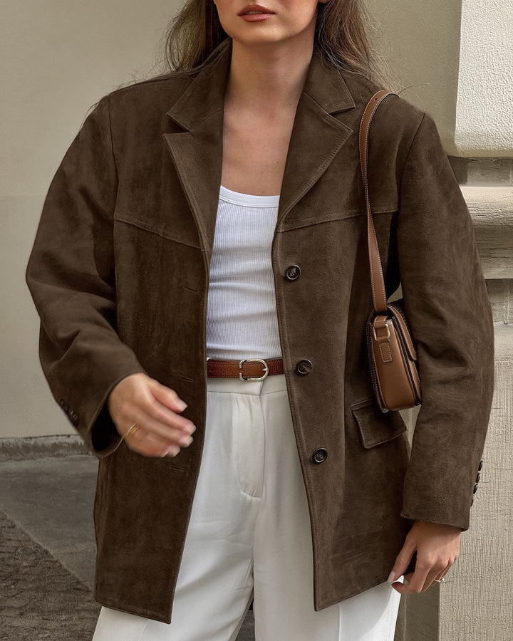 Model wearing a stylish women's one-button blazer, perfect for a sophisticated, comfortable outfit.