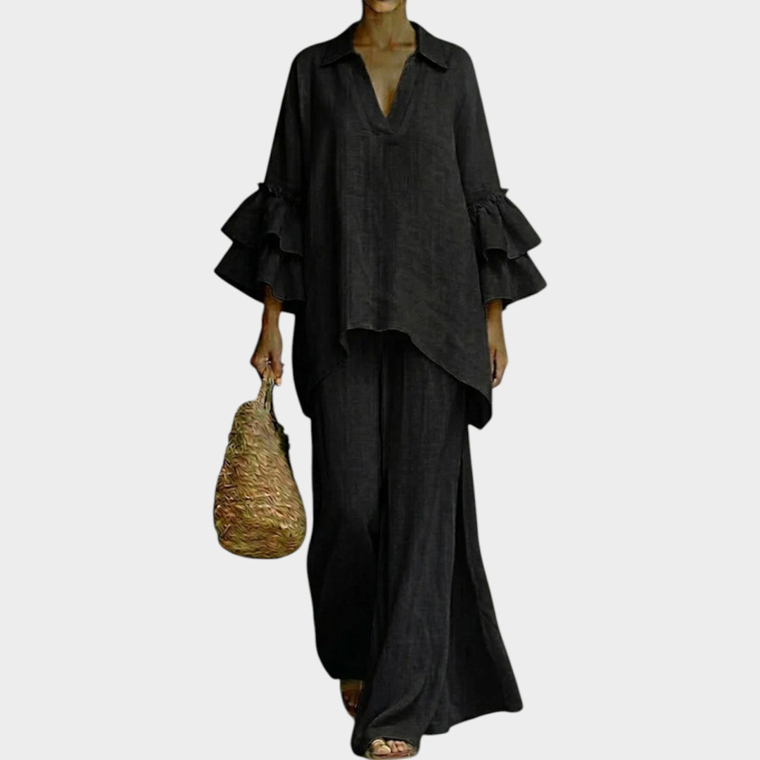 Chic women's two-piece set featuring a breezy flowy ruffle top & comfortable wide leg pants for vacation.