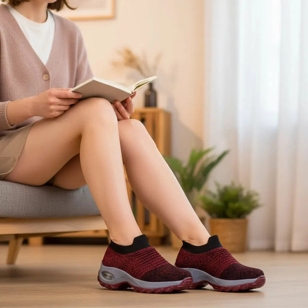 Versatile Red women's sneakers: slip-on, arch support, air cushion sole for ultimate comfort.