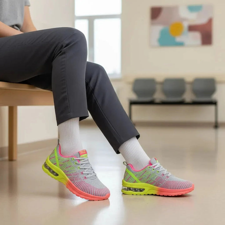 Vibrant purple women's walking shoes with comfy air cushion.