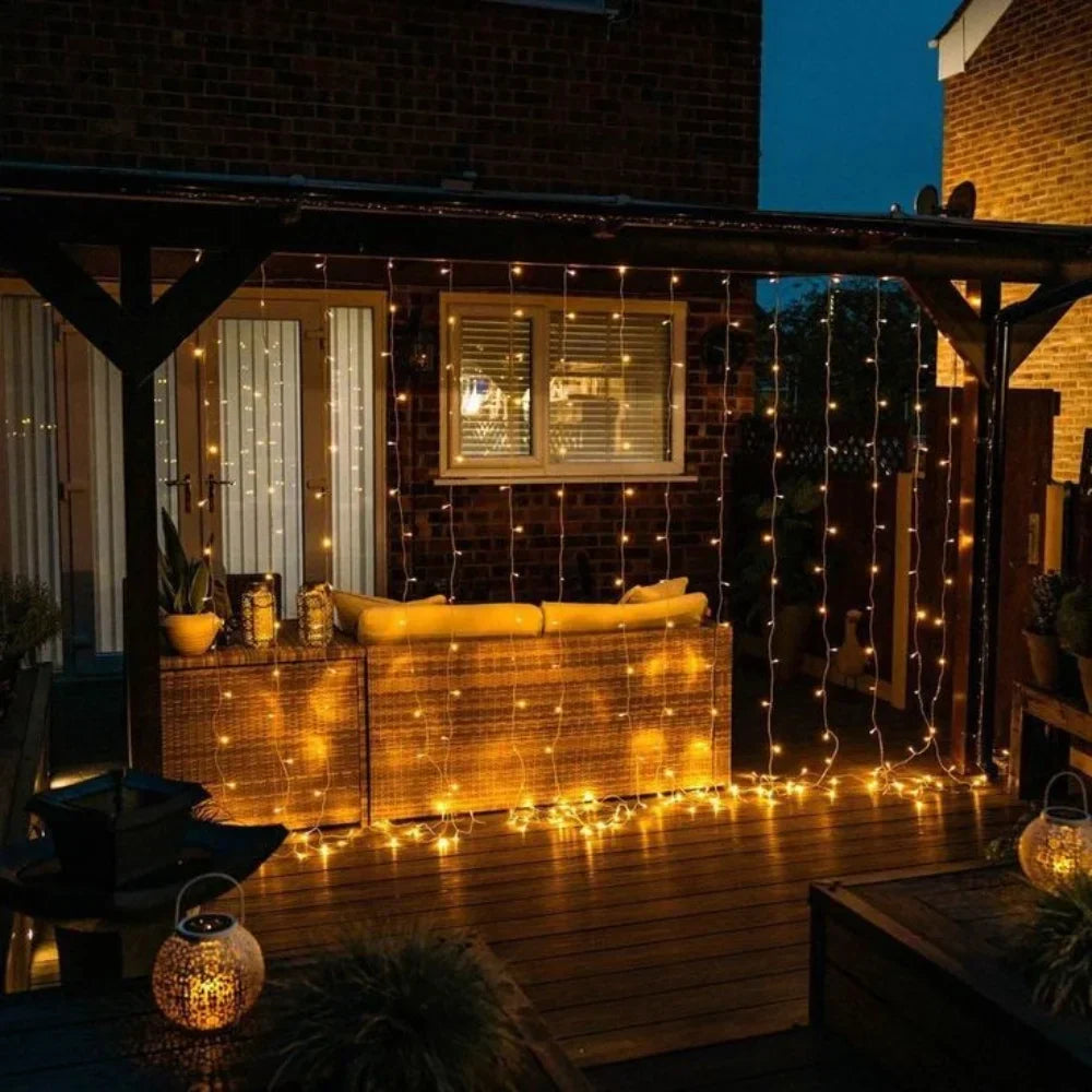 Nvroome warm LED string lights forming a stunning curtain, enhancing any indoor/outdoor space.