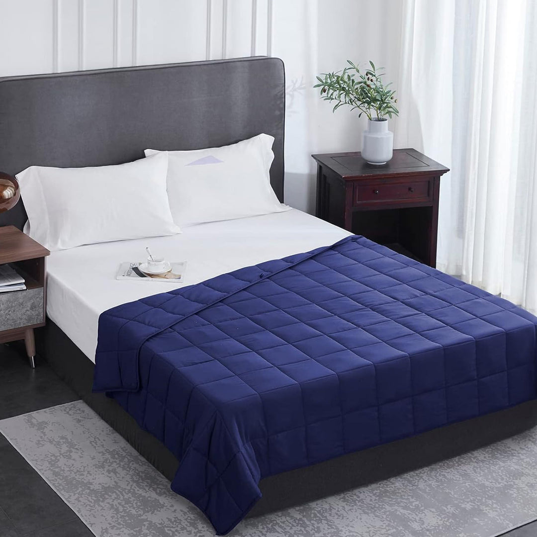 Comfortable and soft weighted blanket, your ultimate companion for unwinding and de-stressing.