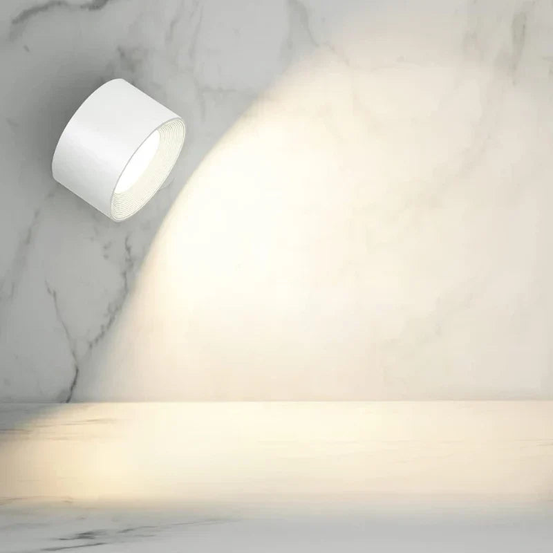 Nvroome rotating LED wall light, cordless and dimmable, great for bedside or kitchen.